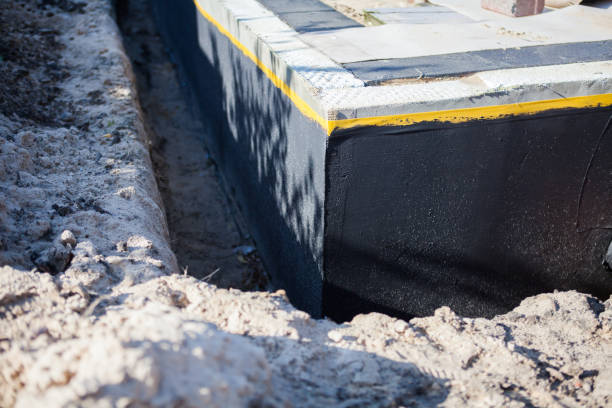 Professional Emergency Waterproofing technician working in New Albany, IN